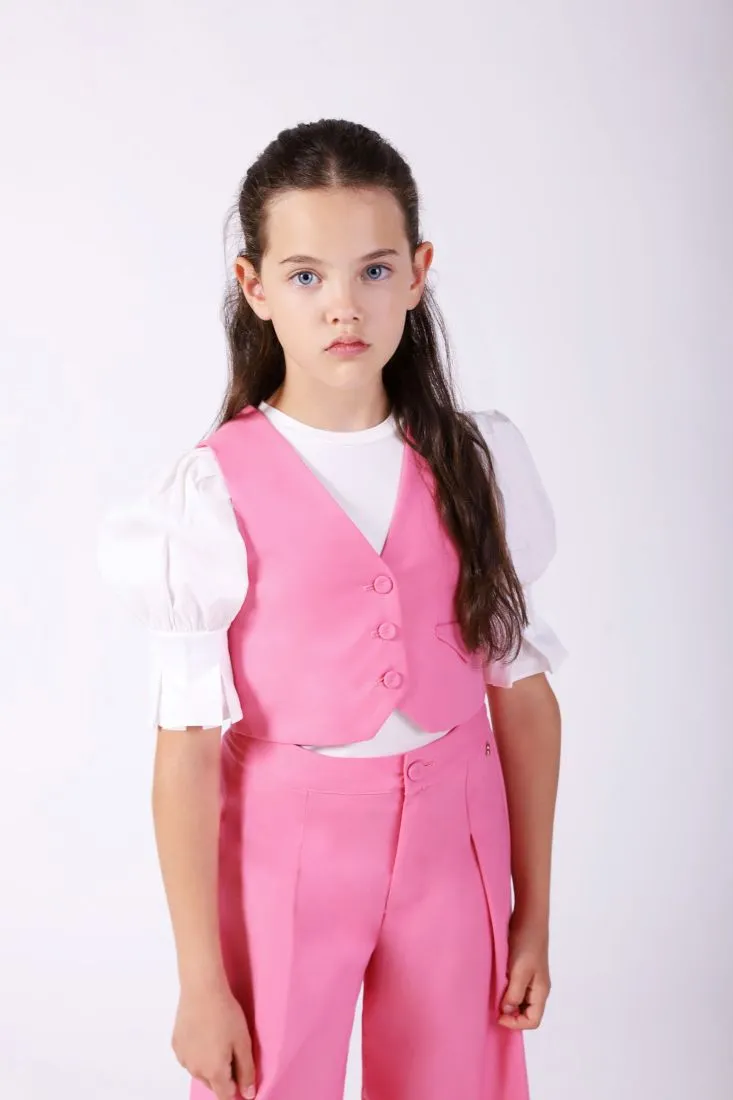Gilet bambina monocolour con taschino a filetto con pattina
