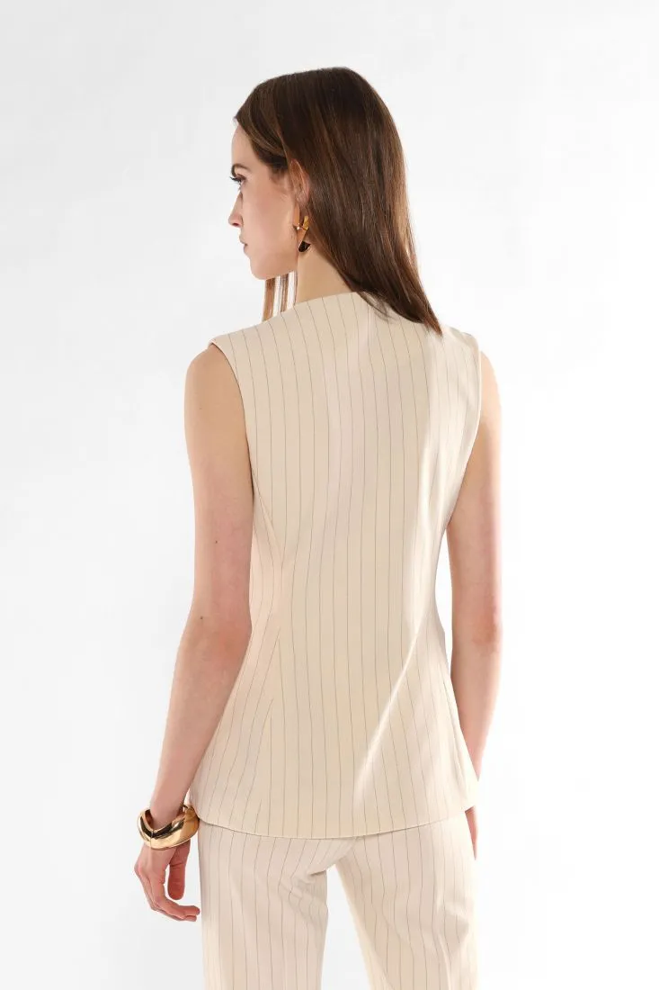 Gilet fantasia gessata con taschini a filetto