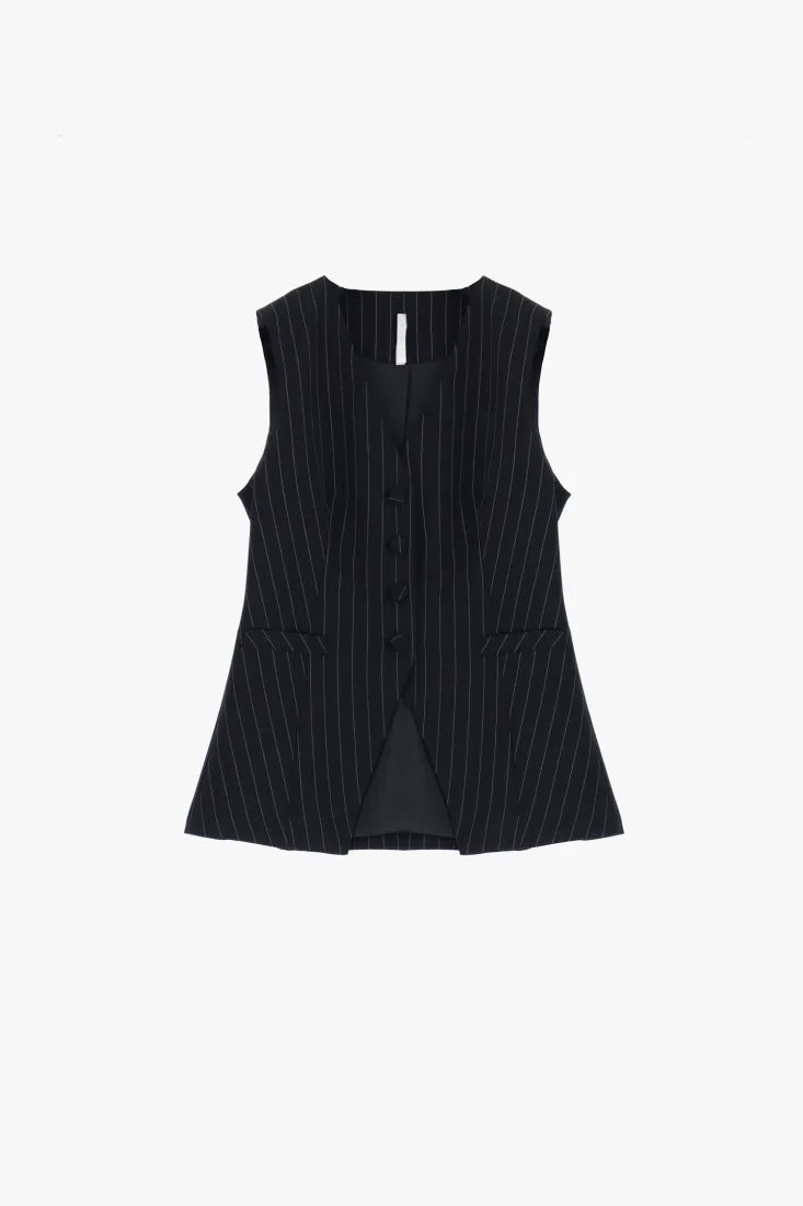 Gilet fantasia gessata con taschini a filetto