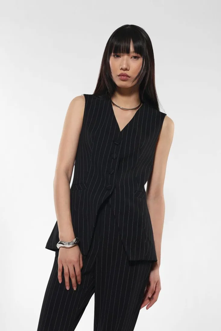 Gilet fantasia gessata con taschini a filetto