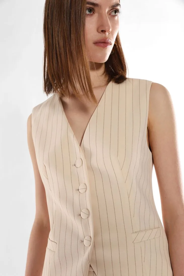 Gilet fantasia gessata con taschini a filetto