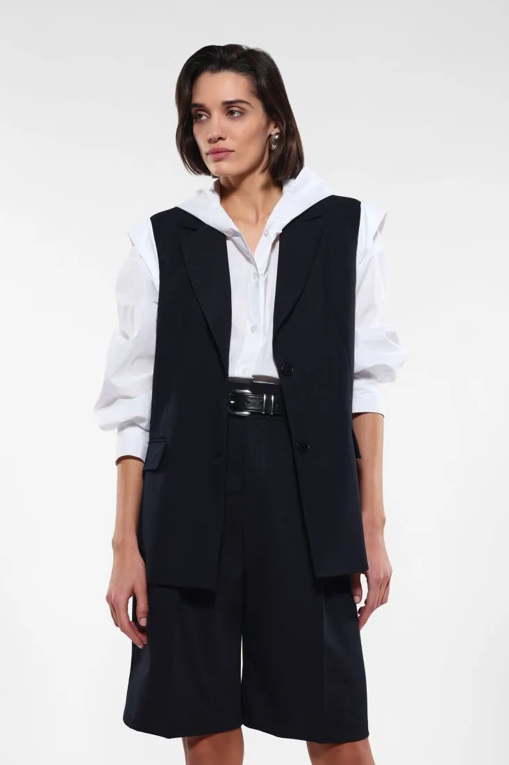 Gilet lungo con tasche a filetto e pattina