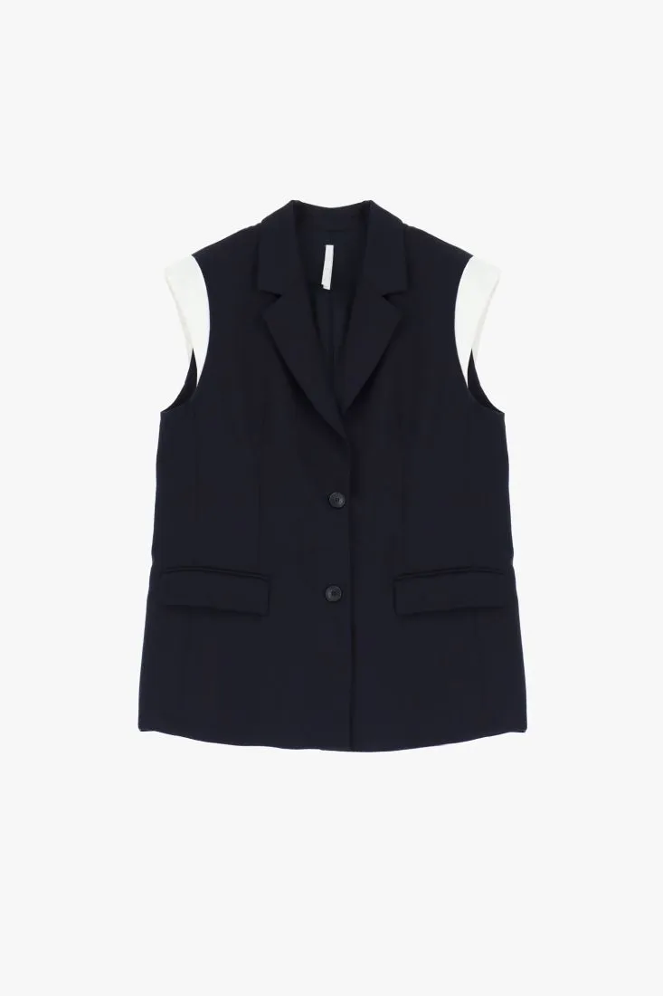 Gilet lungo con tasche a filetto e pattina