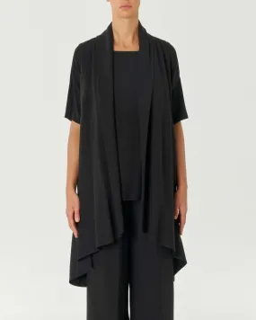 Gilet lungo nero in viscosa e lino con scollo sciallato e fondo a punte