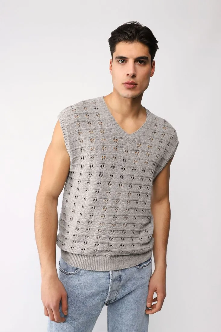 Gilet monocolour con lavorazione traforata