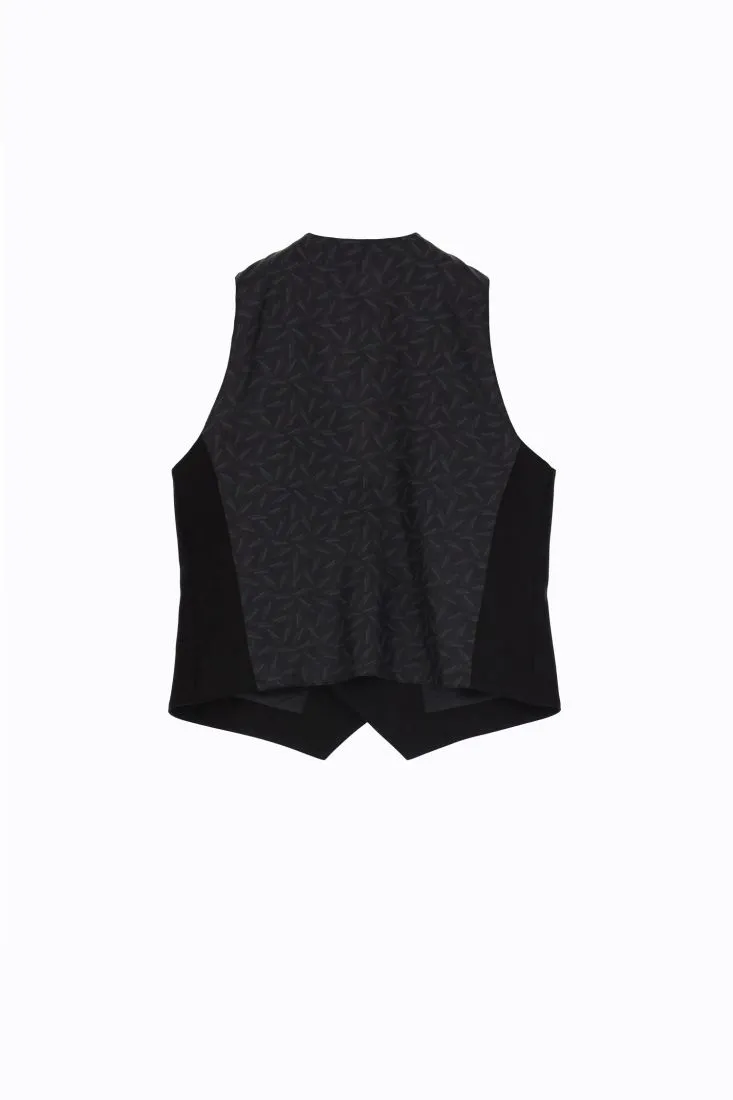 Gilet monocolour doppiopetto con tasche a filetto