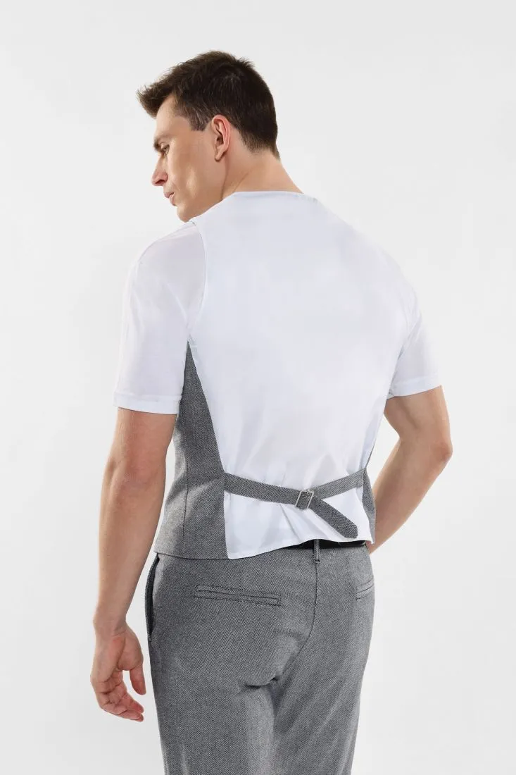 Gilet monopetto con bottoni a contrasto e martingala