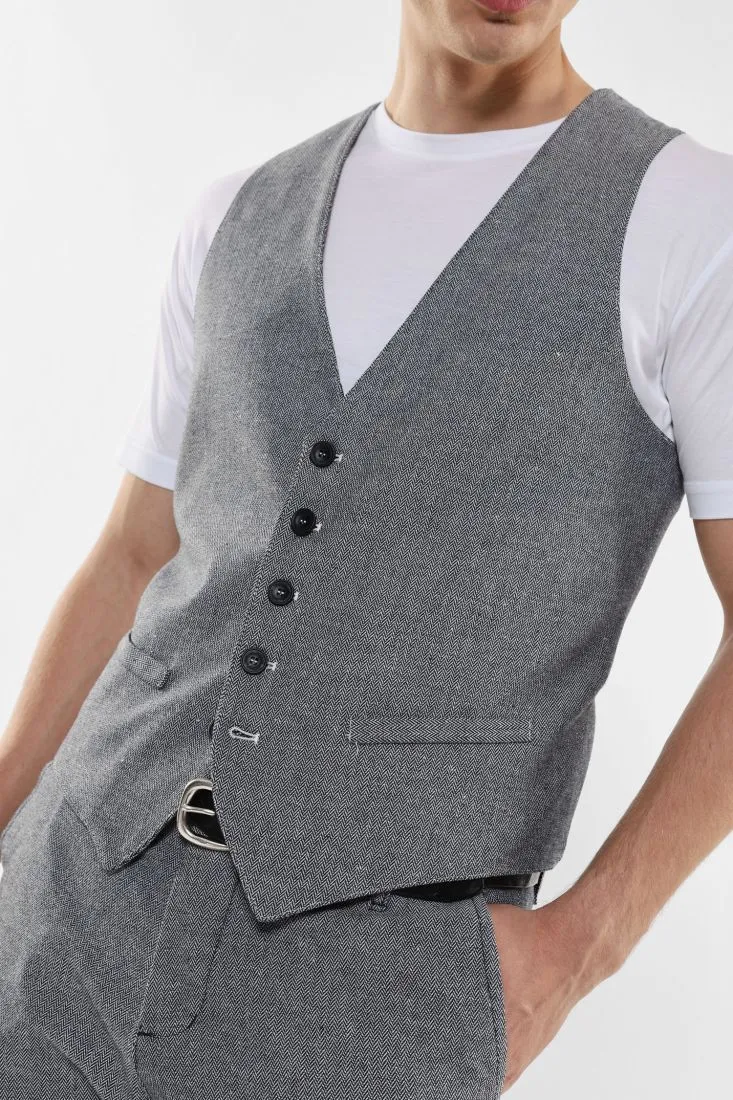 Gilet monopetto con bottoni a contrasto e martingala