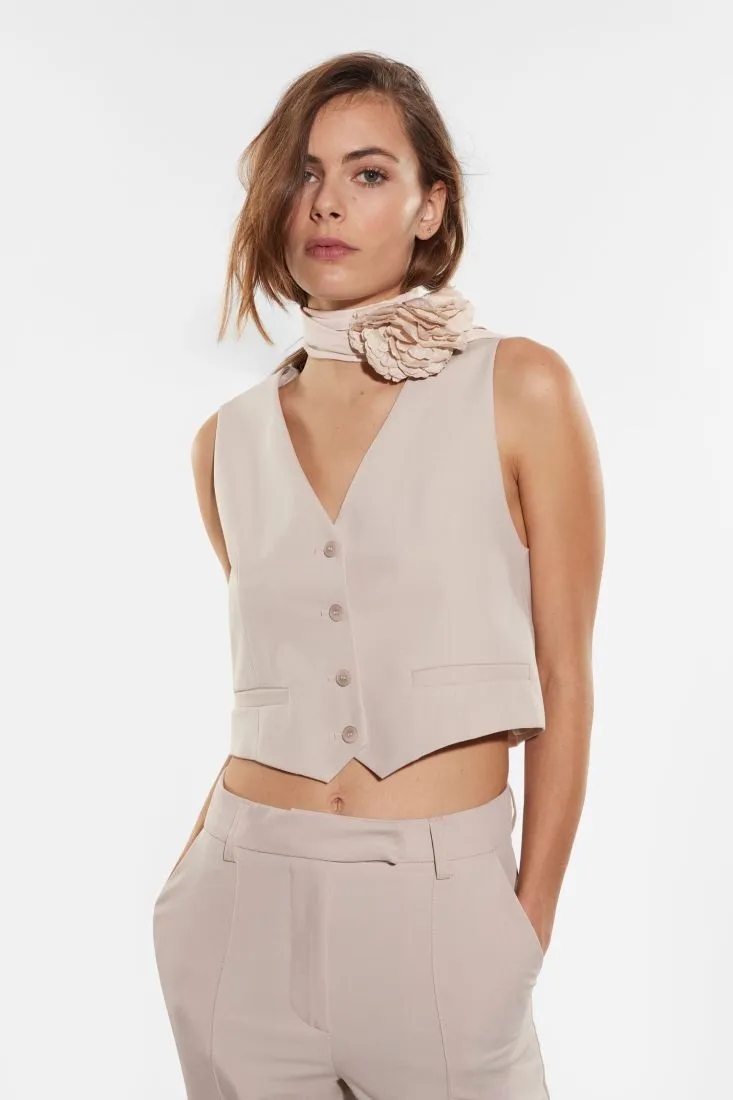 Gilet monopetto con taschini a filetto