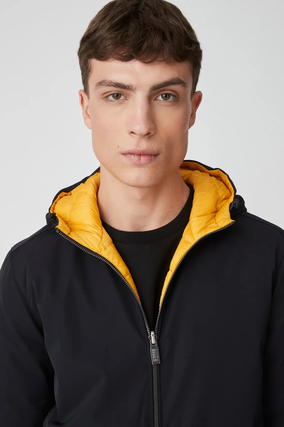 HENRY – Piumino nero e giallo reversibile