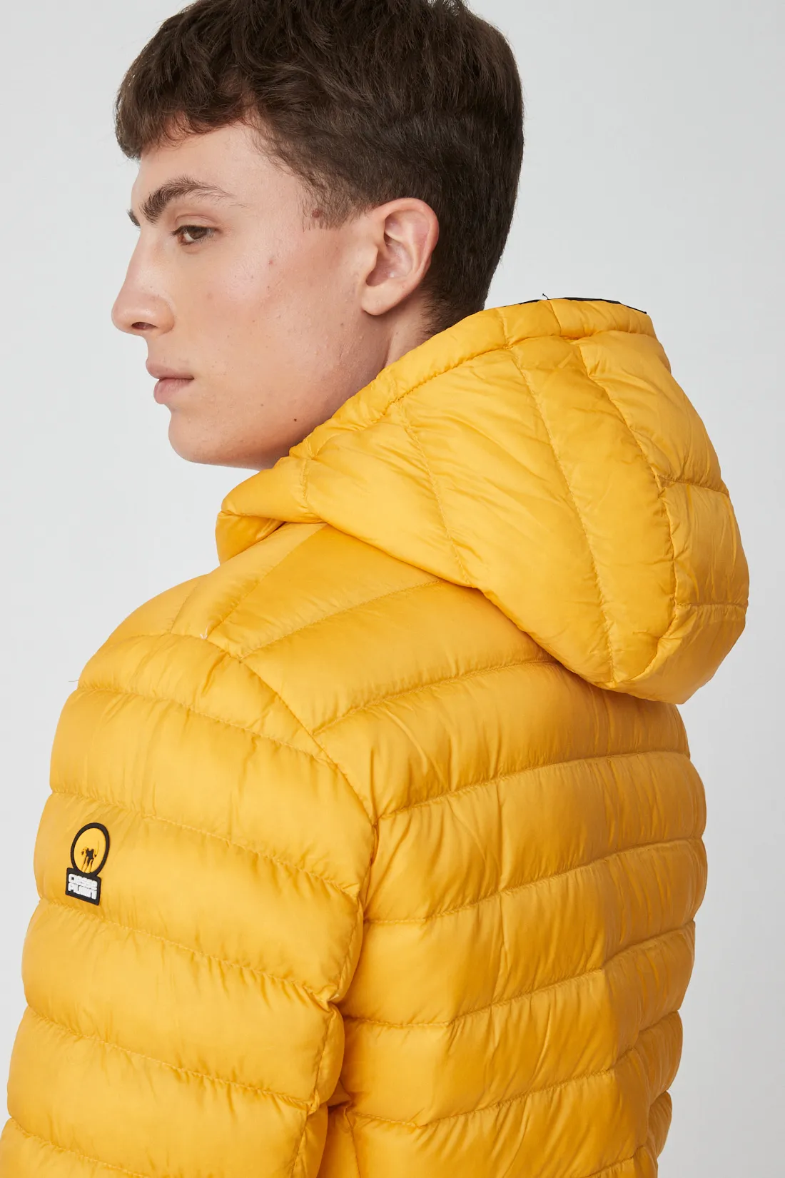 HENRY – Piumino nero e giallo reversibile