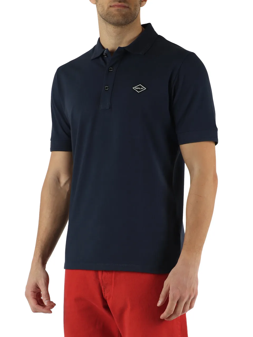 Polo in cotone piquet con patch logo frontale