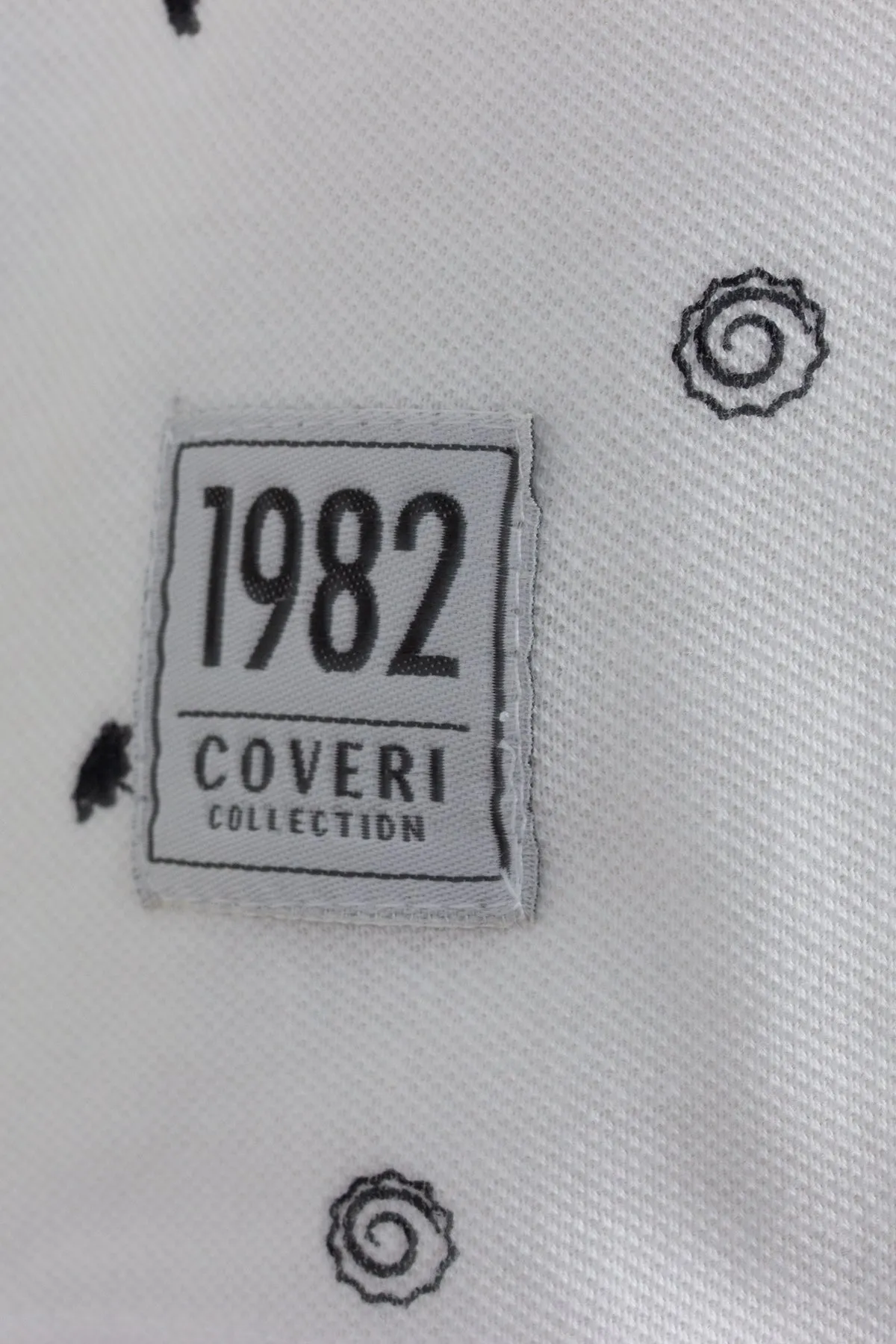 Polo microfantasia con collo alla coreana
