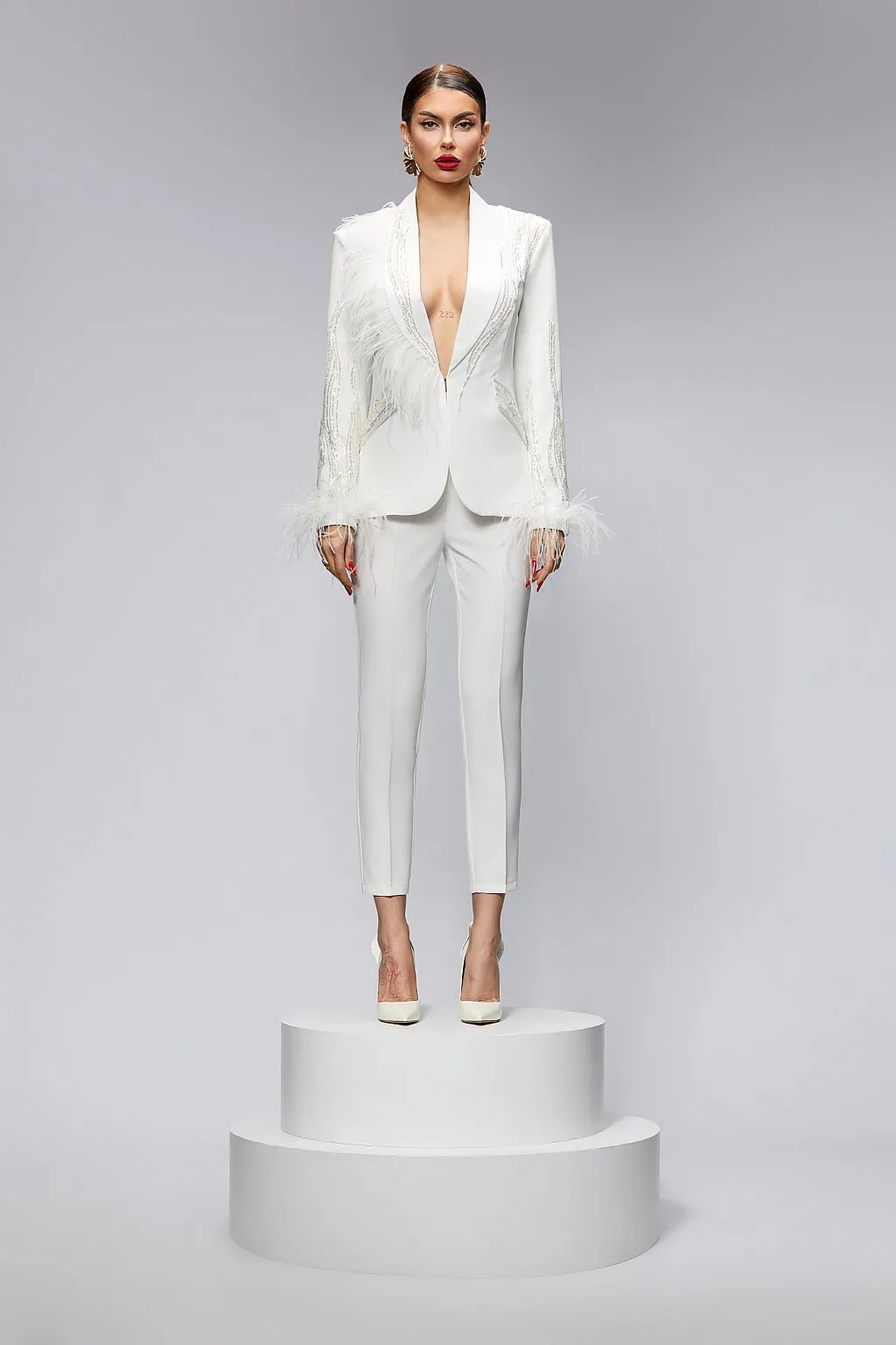 Tailleur con giacca e pantaloni aderenti