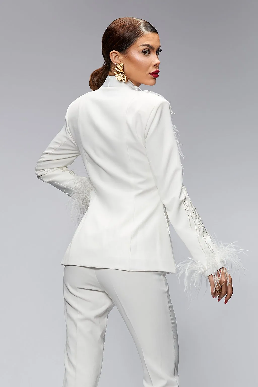Tailleur con giacca e pantaloni aderenti