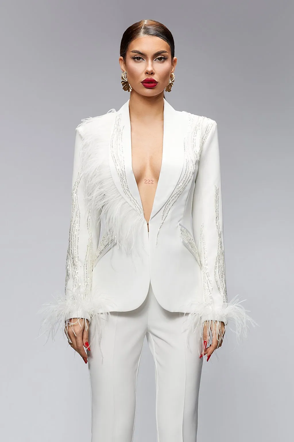 Tailleur con giacca e pantaloni aderenti