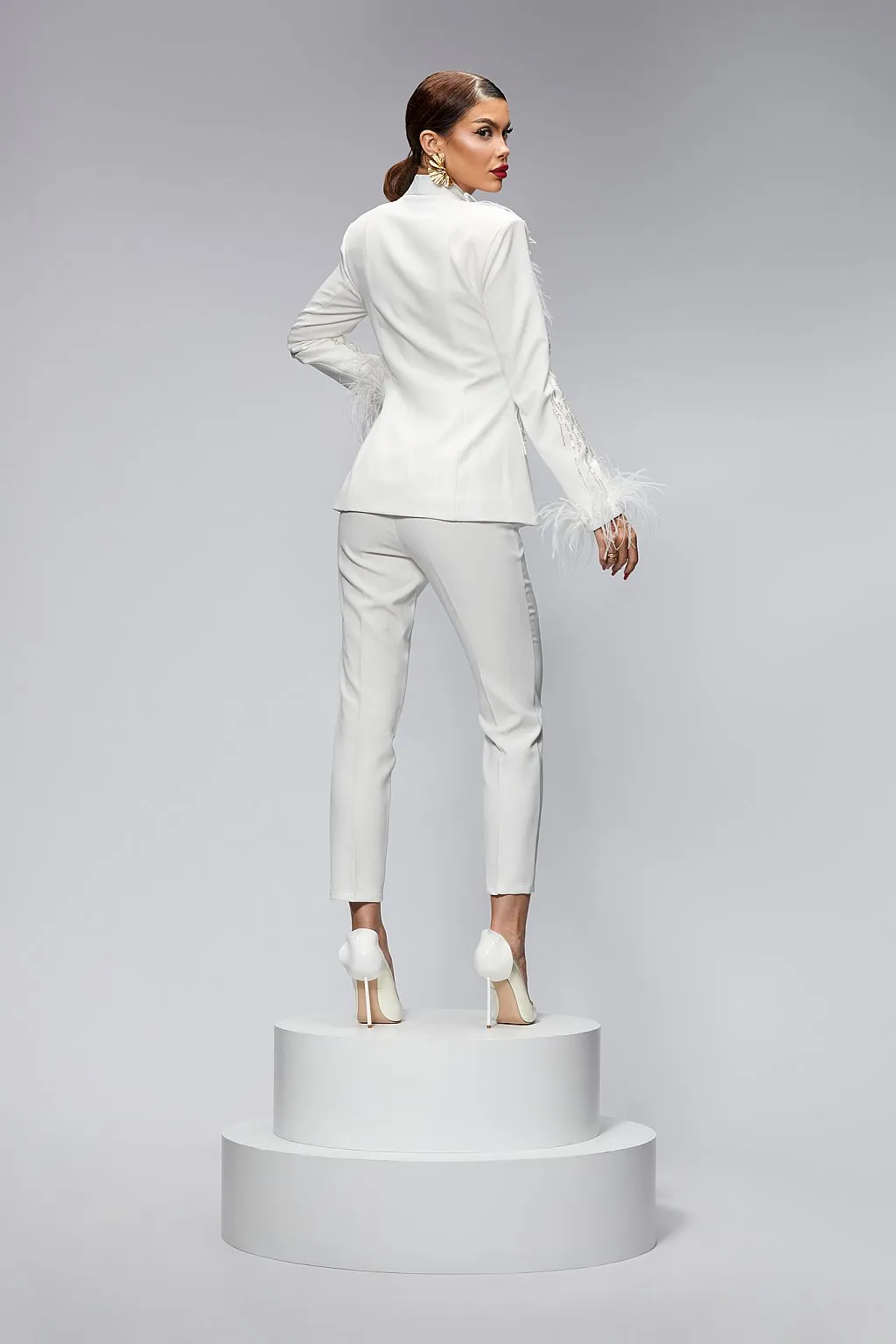 Tailleur con giacca e pantaloni aderenti
